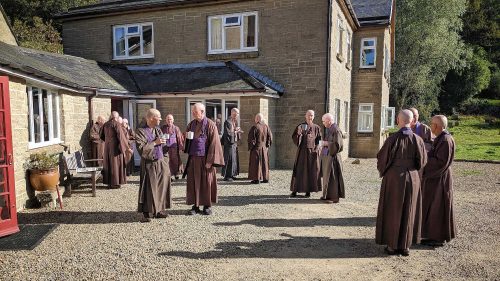 Monks drinking tea in the sun