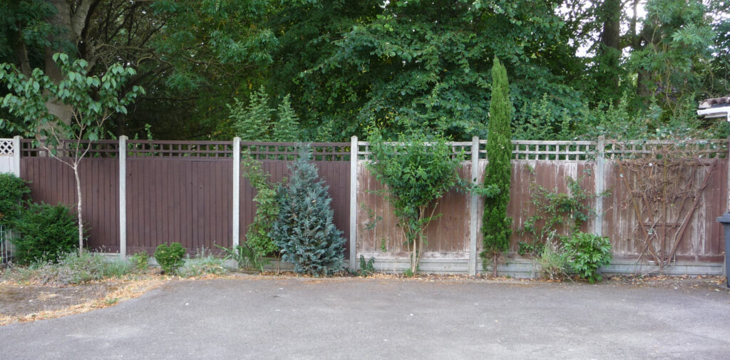 Click to enlarge Front fences partly stained