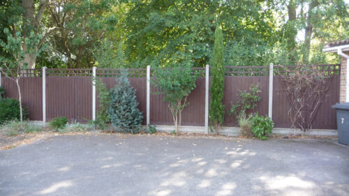Click to enlarge The newly-stained fence panels